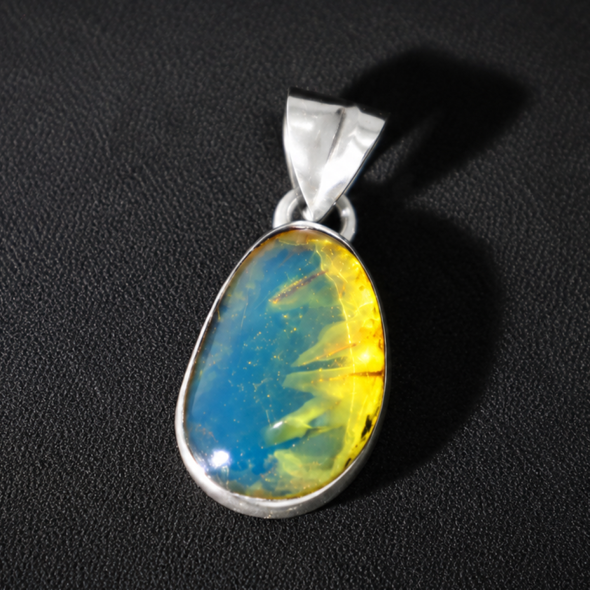 Clear deep blue Natural Dominican Amber teardrop 925 Sterling Pendant 28 mm
