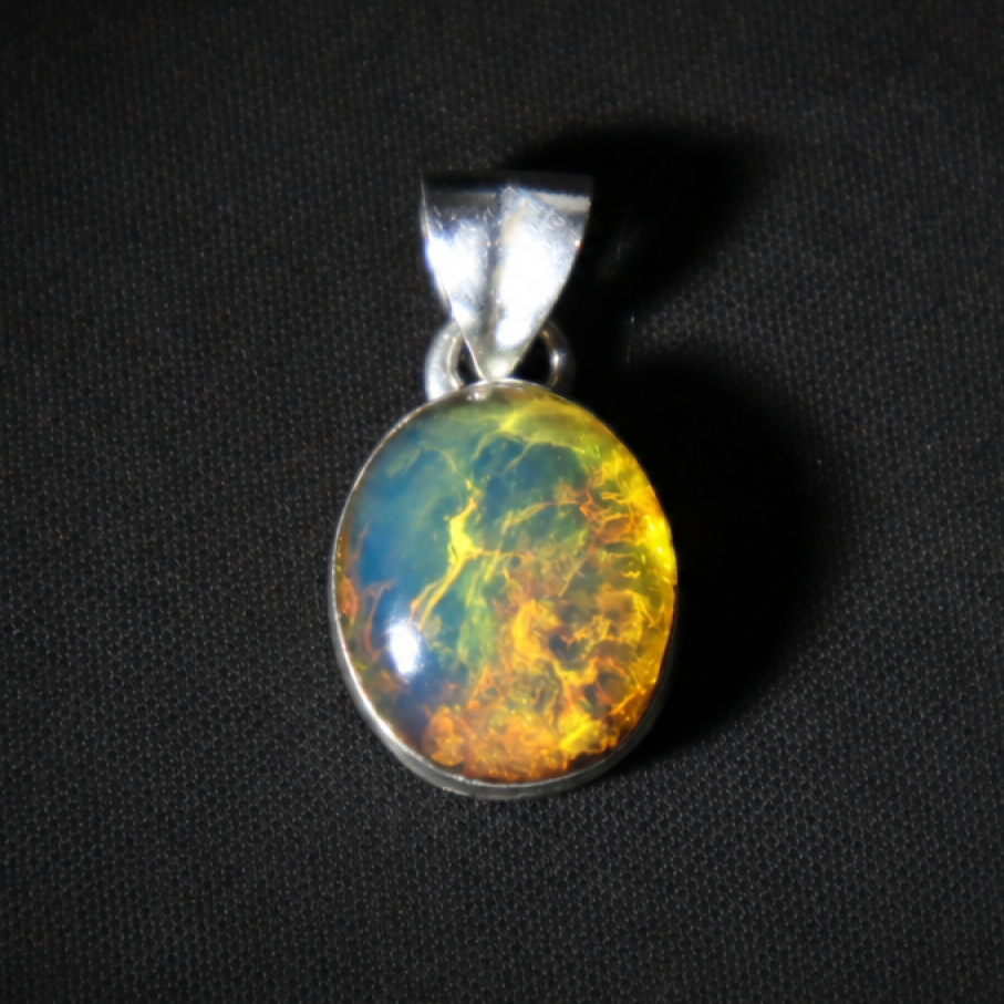 Translucent sky blue Natural Dominican Amber oval 925 Sterling Pendant 22 mm