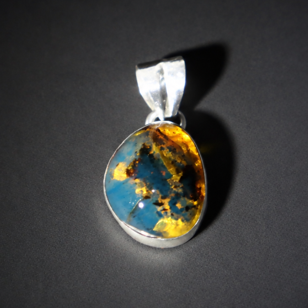 Translucent deep blue Natural Dominican Amber oval 925 Sterling Pendant 24 mm