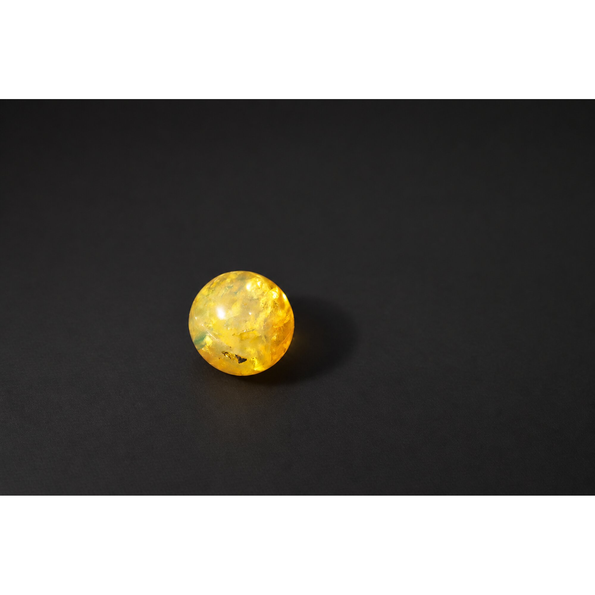 Untreated olive green yellow Dominican amber sphere/ball 18.7mm – photo 6