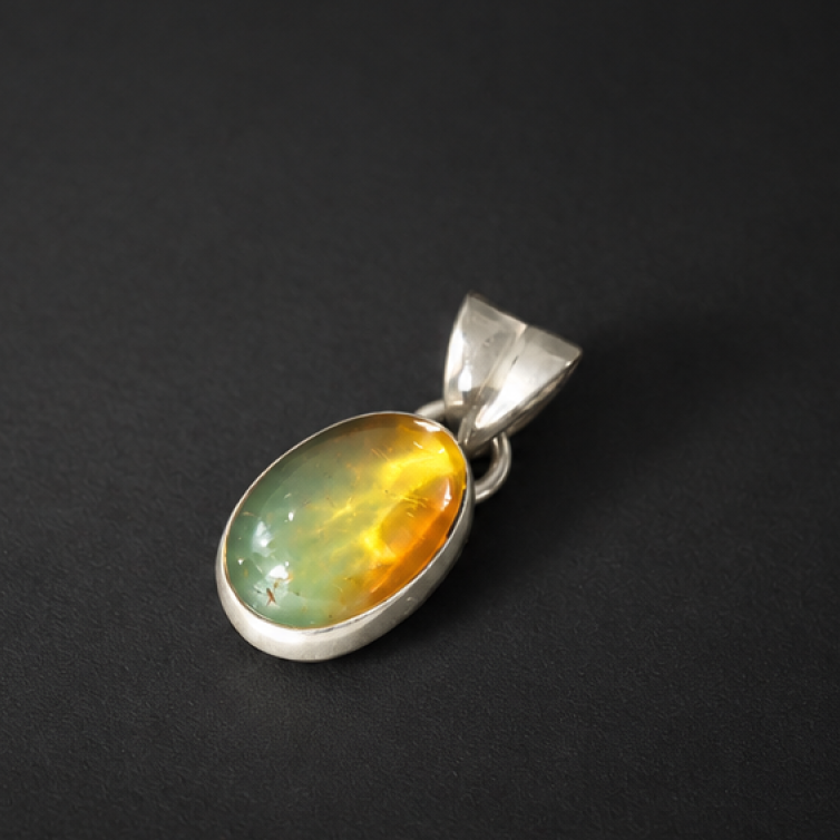 Artisan crafted orange green Dominican amber sterling silver pendant 20.5mm
