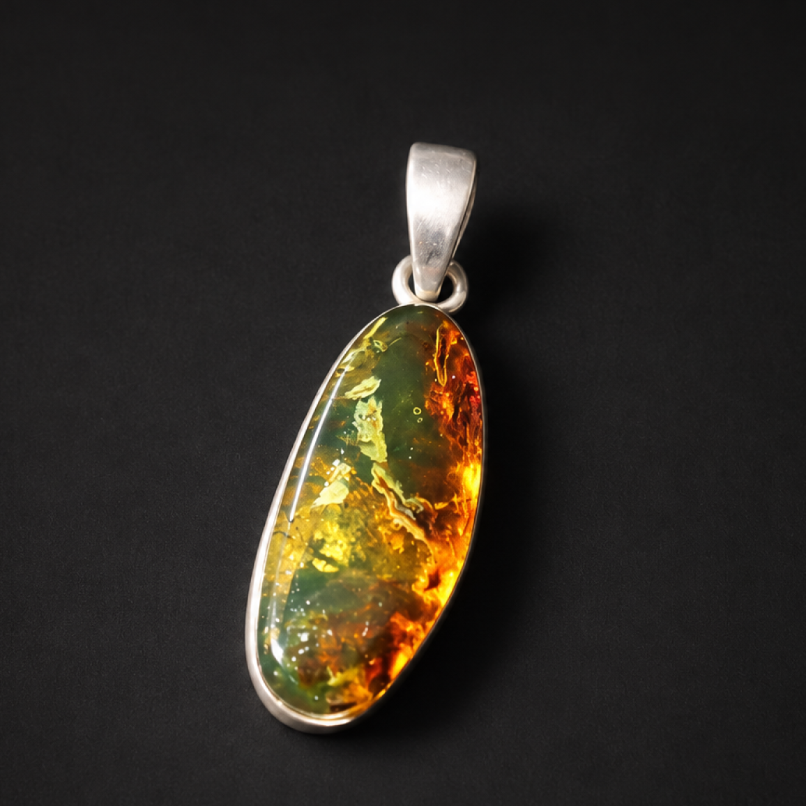 Handcrafted orange green Dominican amber sterling silver pendant 31mm