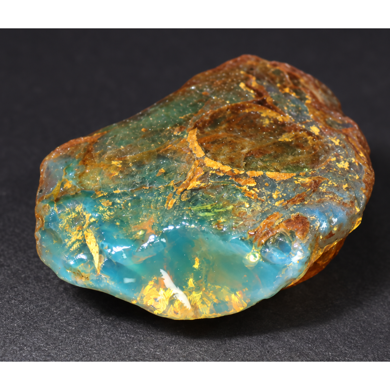 Real orange blue rough specimen Dominican amber 44mm