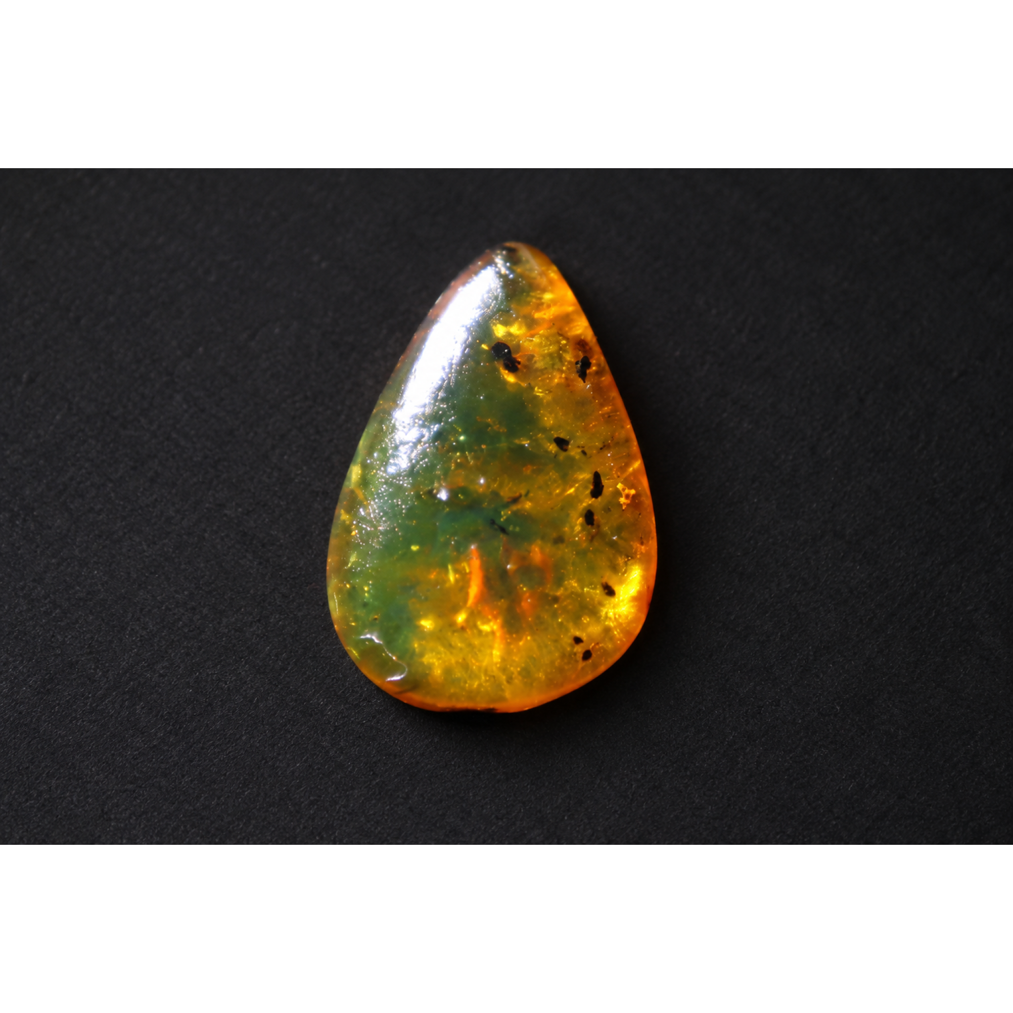 Untreated green orange polished Dominican amber 1.2g – photo 2