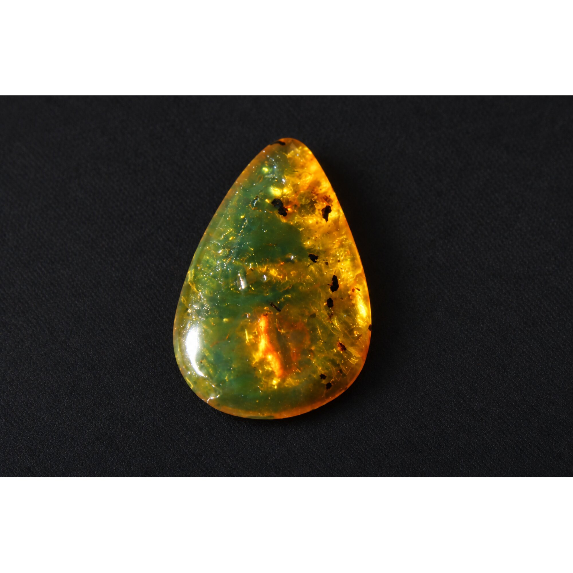 Untreated green orange polished Dominican amber 1.2g – photo 6
