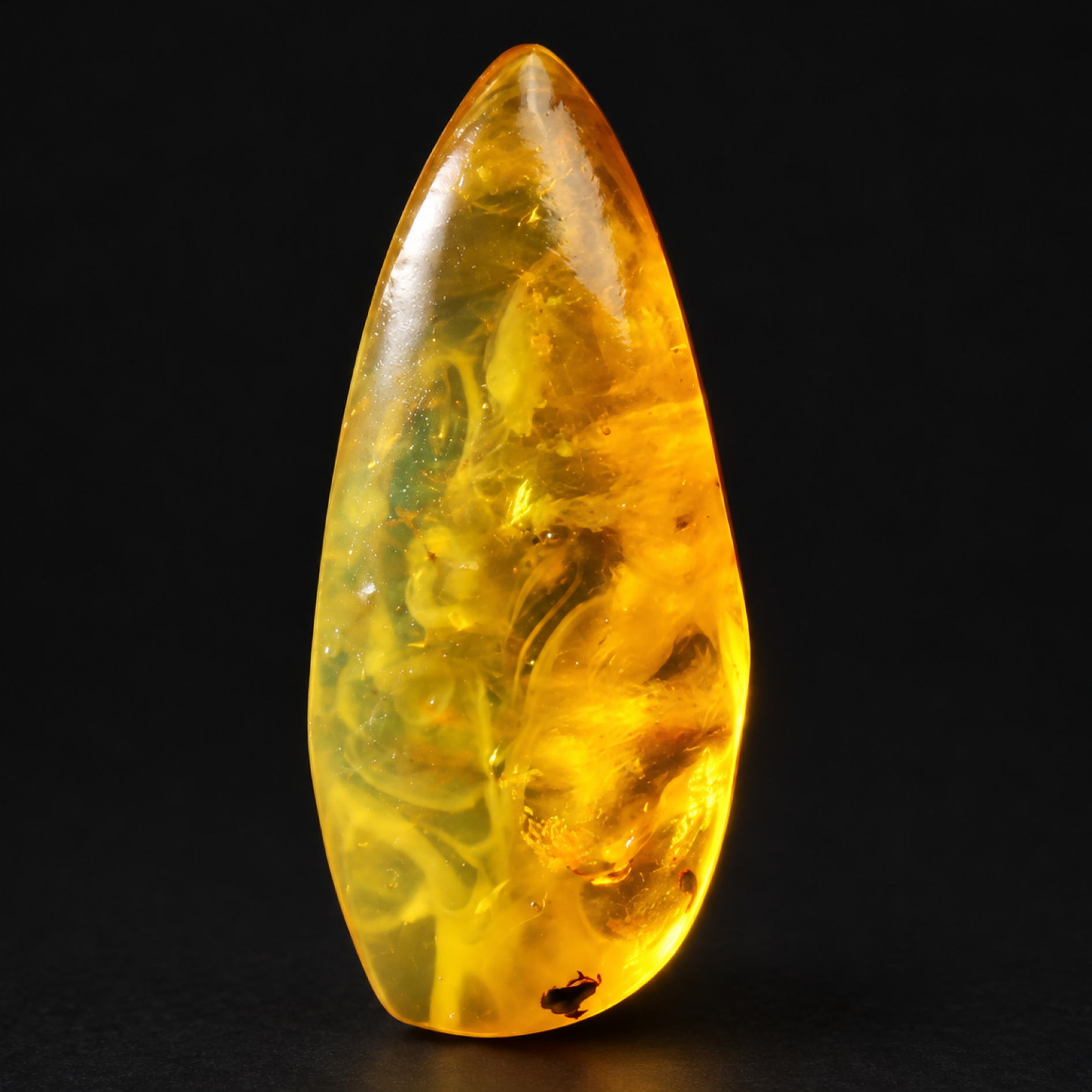 Natural yellow green polished Dominican amber
