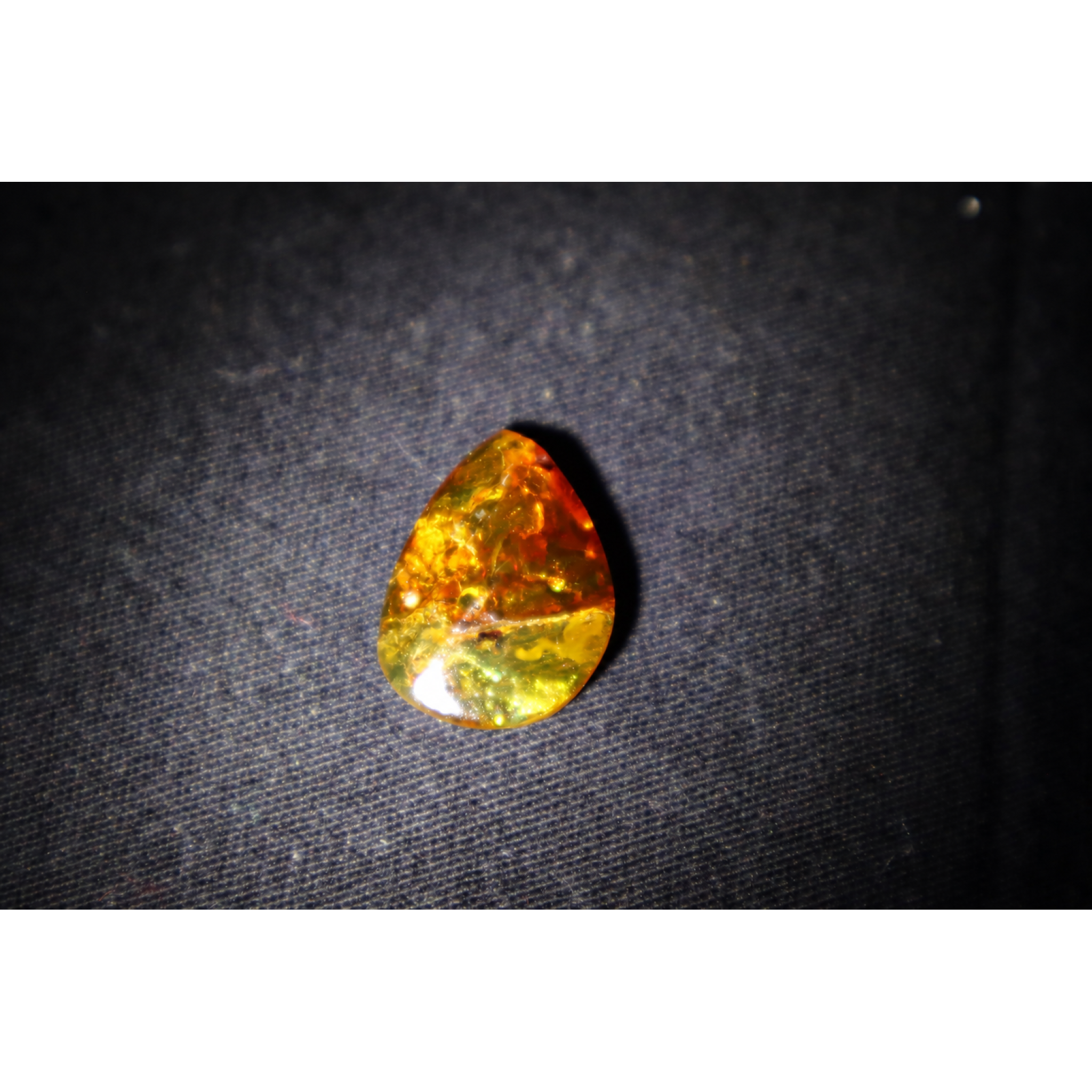 Natural yellow brown Dominican amber cabochon – photo 4