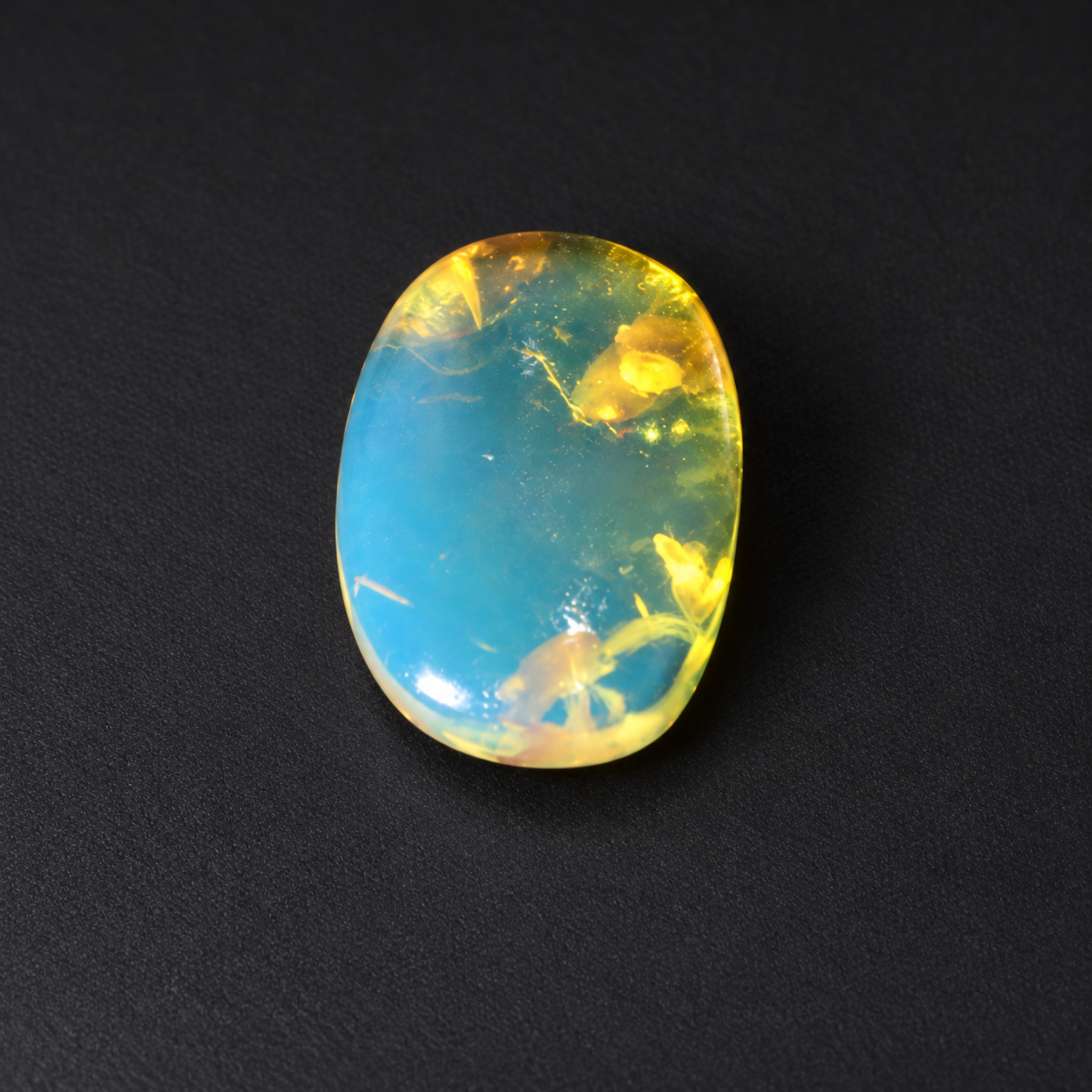 Natural sky blue Dominican amber cabochon – photo 2