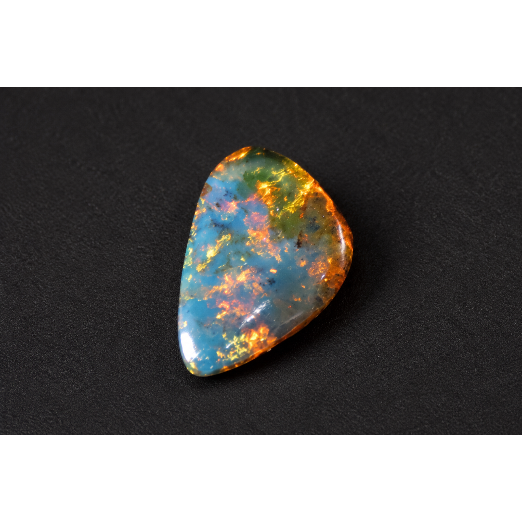 Nature created orange blue Dominican amber cabochon – photo 6