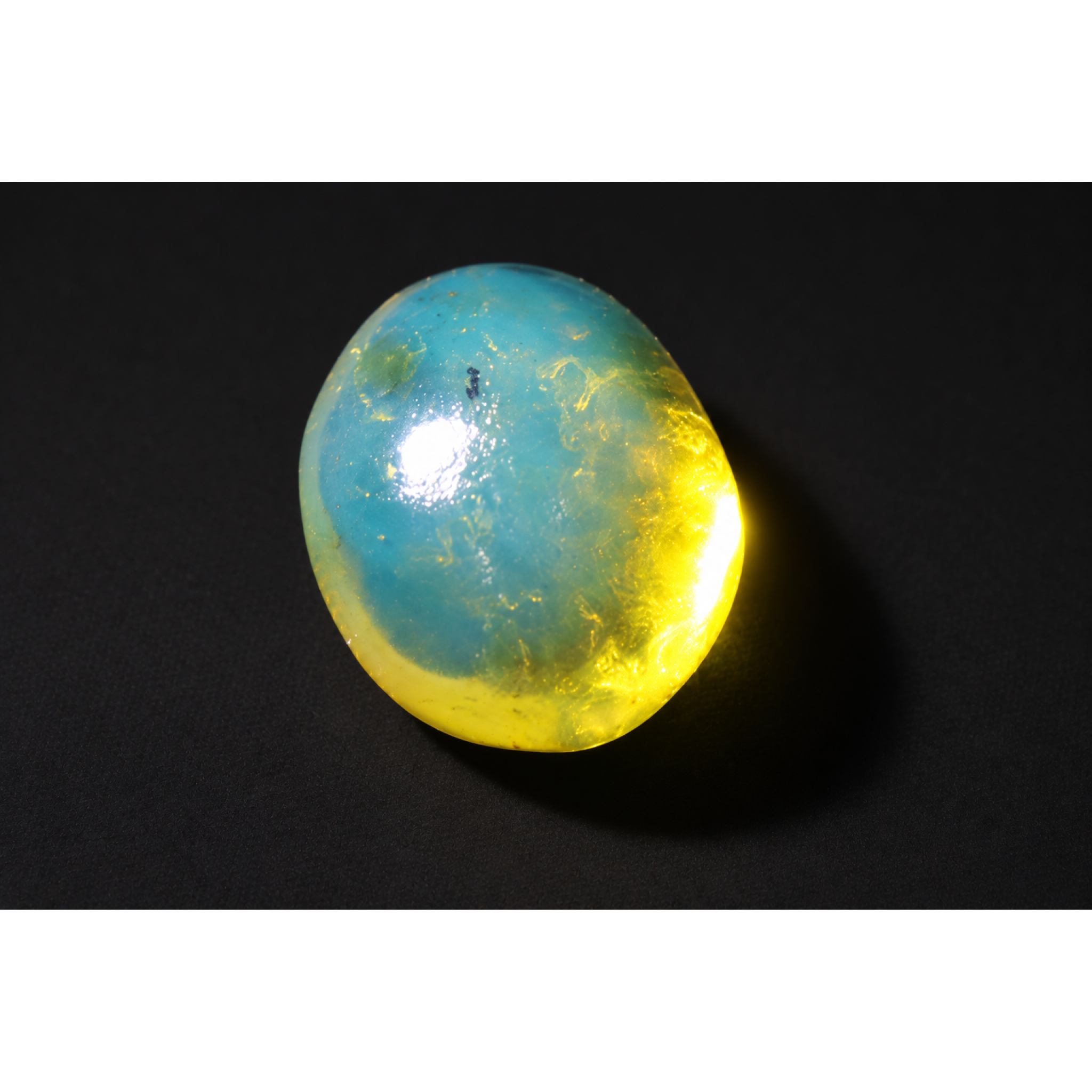 Nature created deep blue Dominican amber cabochon – photo 2