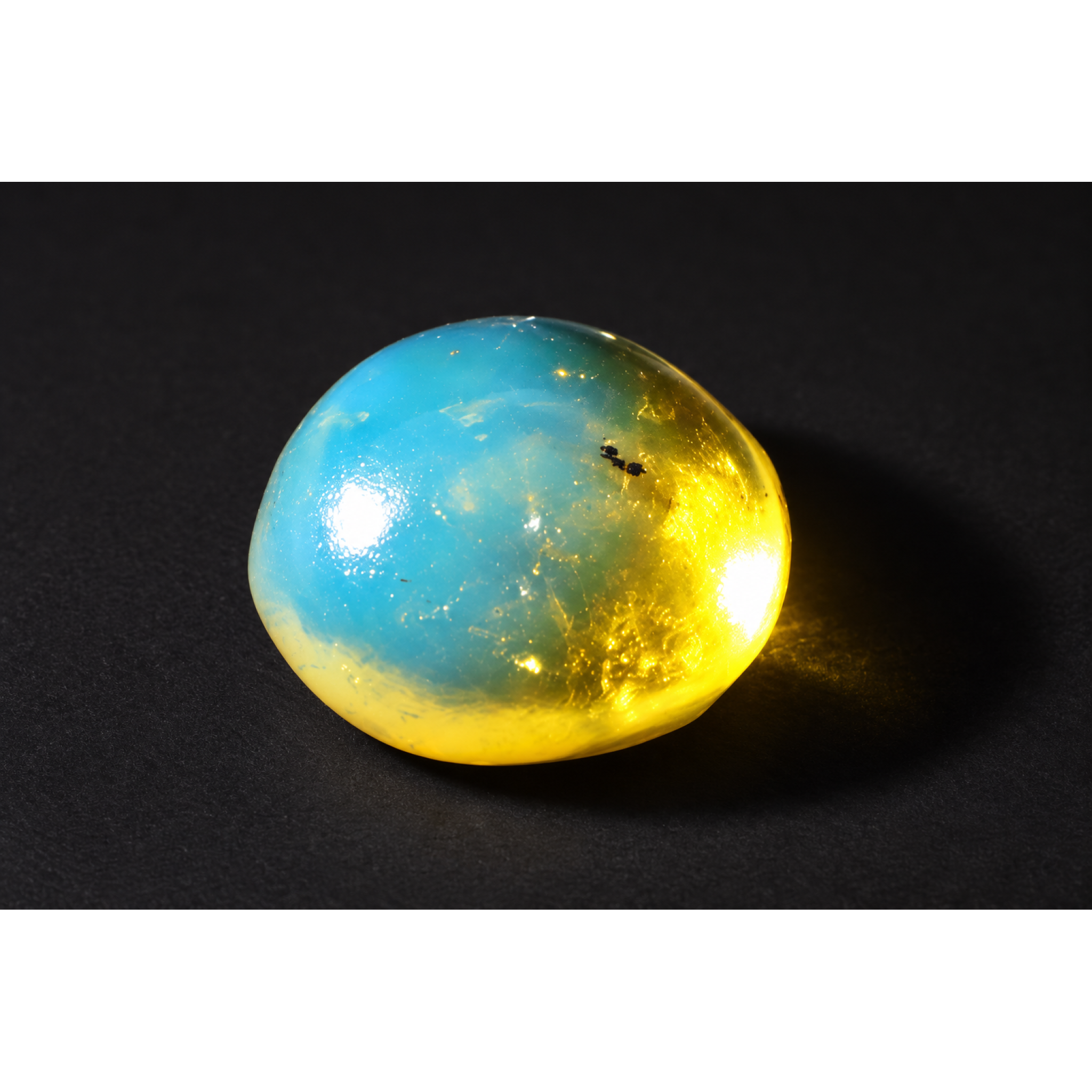 Nature created deep blue Dominican amber cabochon – photo 3