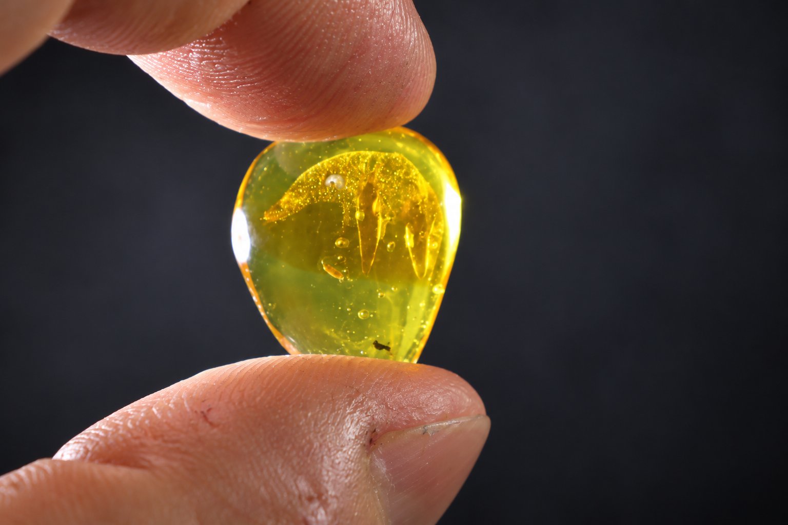 Authentic orange green Dominican amber cabochon – photo 8