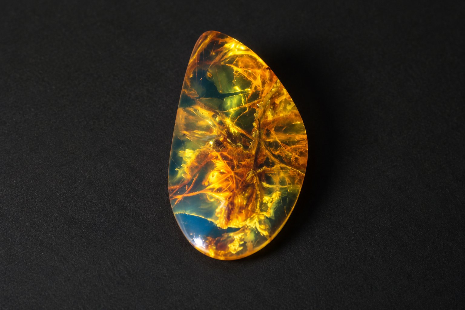Authentic deep blue Dominican amber cabochon – photo 2