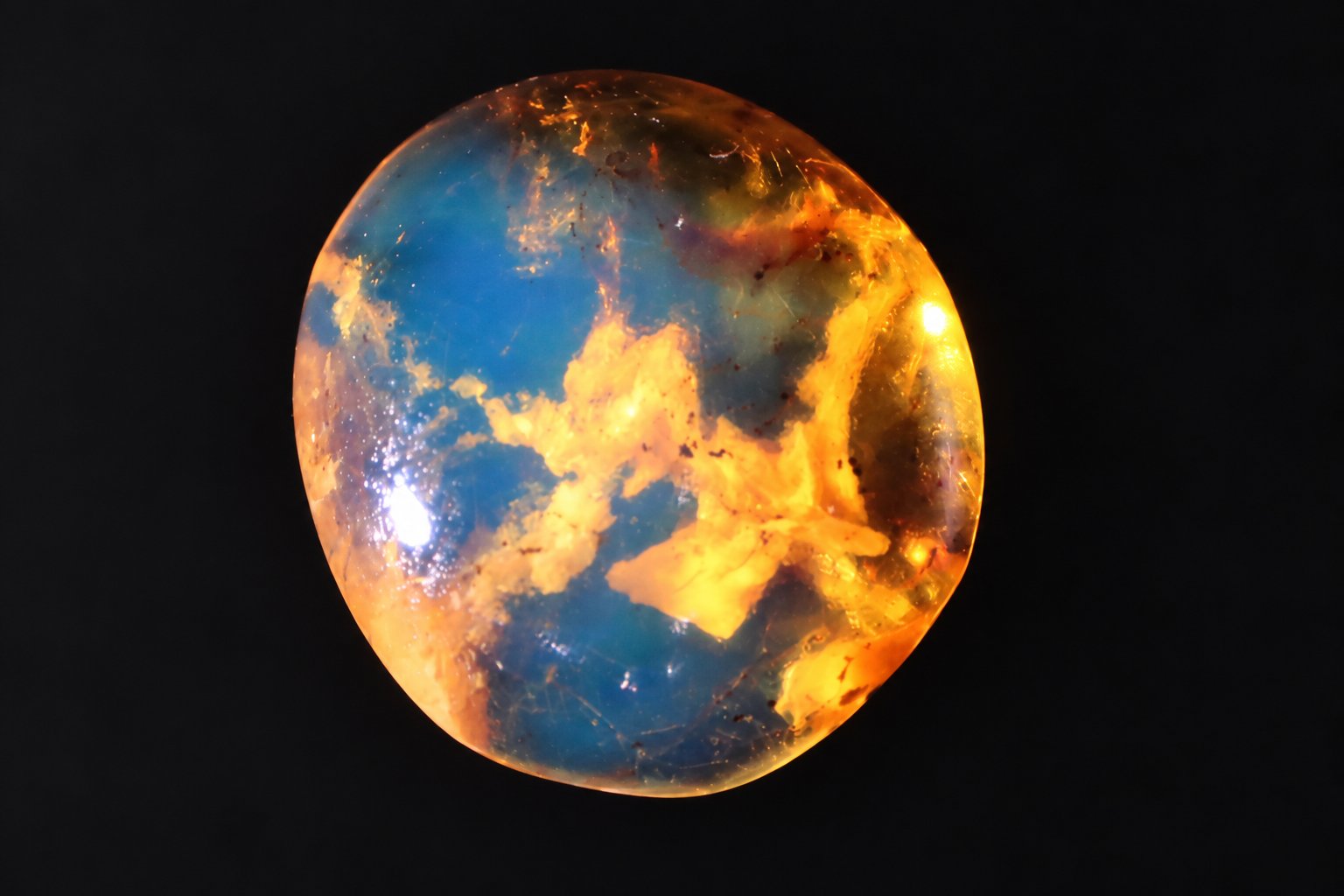 Authentic deep blue Dominican amber cabochon – photo 10