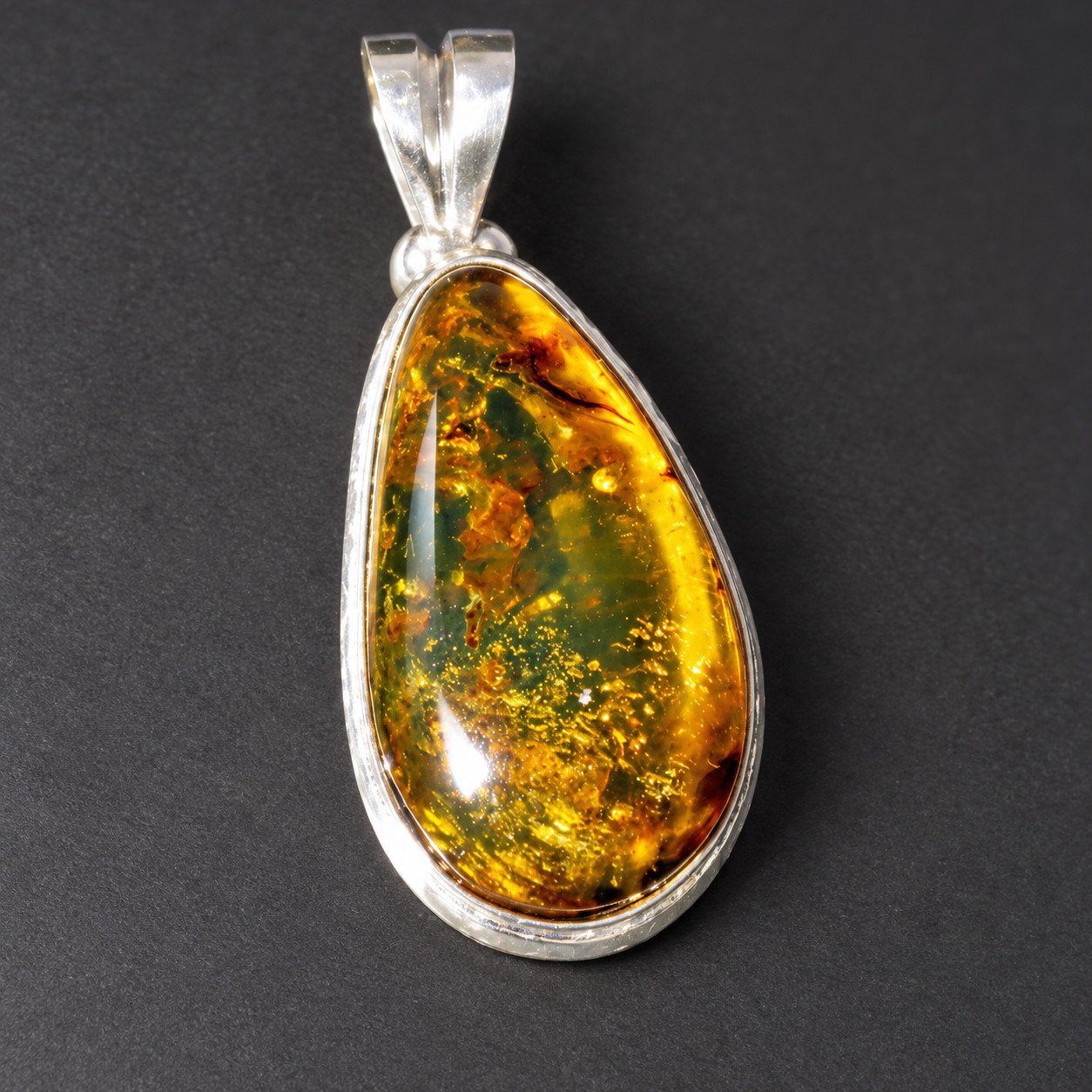 Studio made olive green Dominican amber sterling silver pendant 1.1g