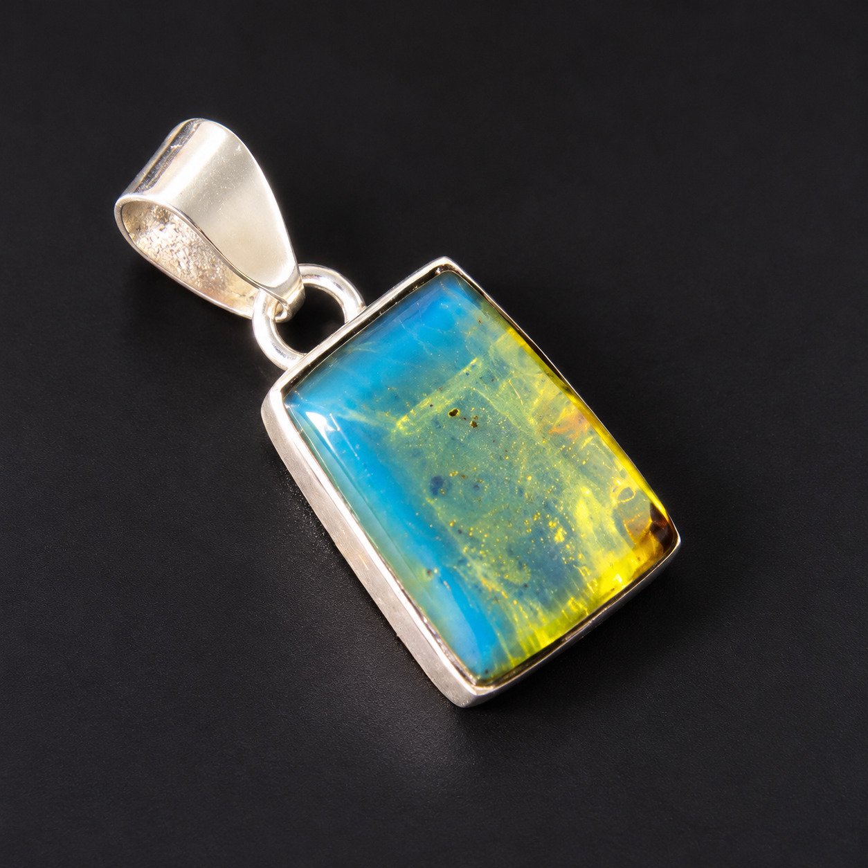 Timeless deep blue Dominican amber sterling silver pendant 2g