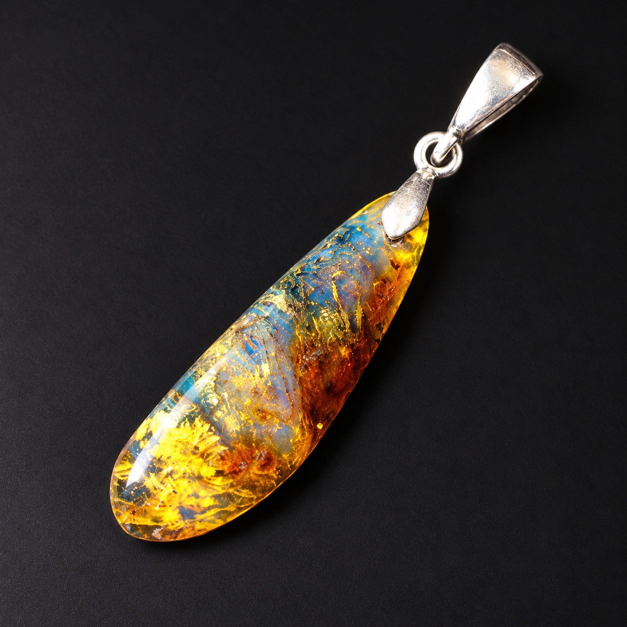 Organic beauty orange blue Dominican amber sterling silver pendant 1.1g