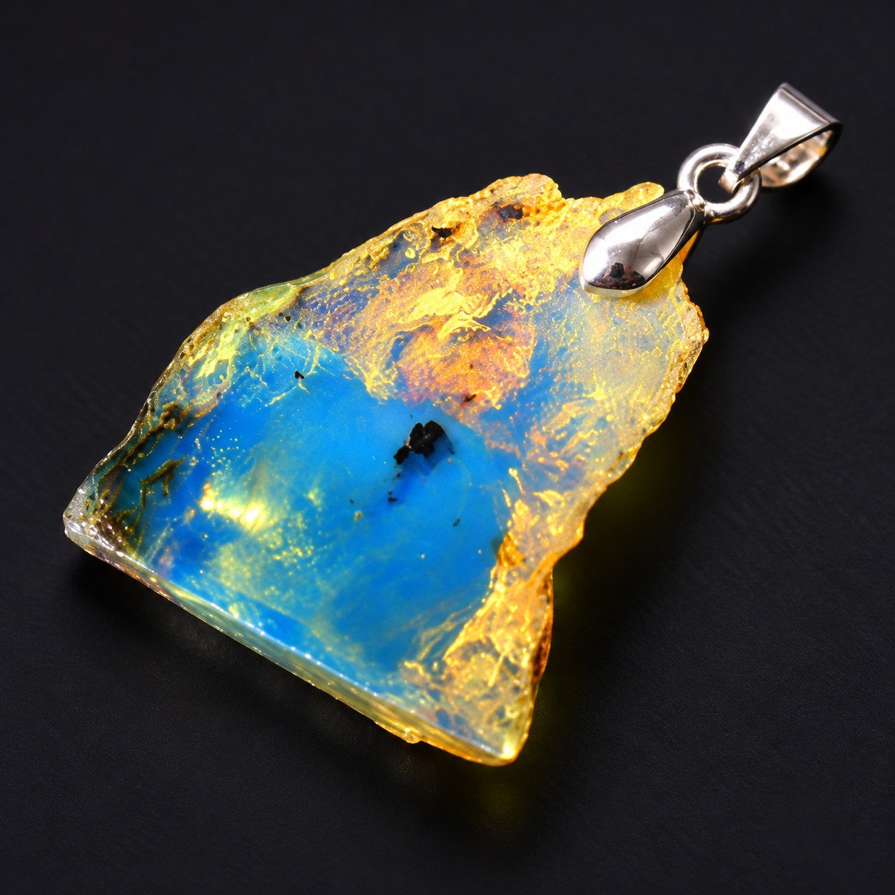 Raw beauty sky blue Dominican amber sterling silver pendant 1.9g