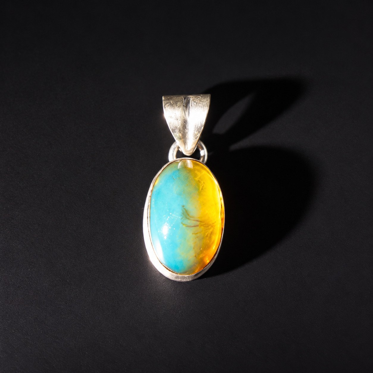 Studio made sky blue Dominican amber sterling silver pendant 1.7g