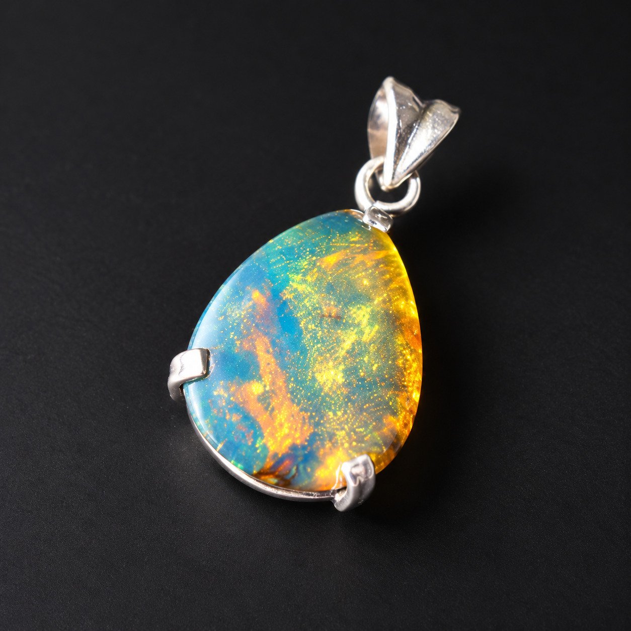 Expertly crafted orange blue Dominican amber sterling silver pendant 2.5g