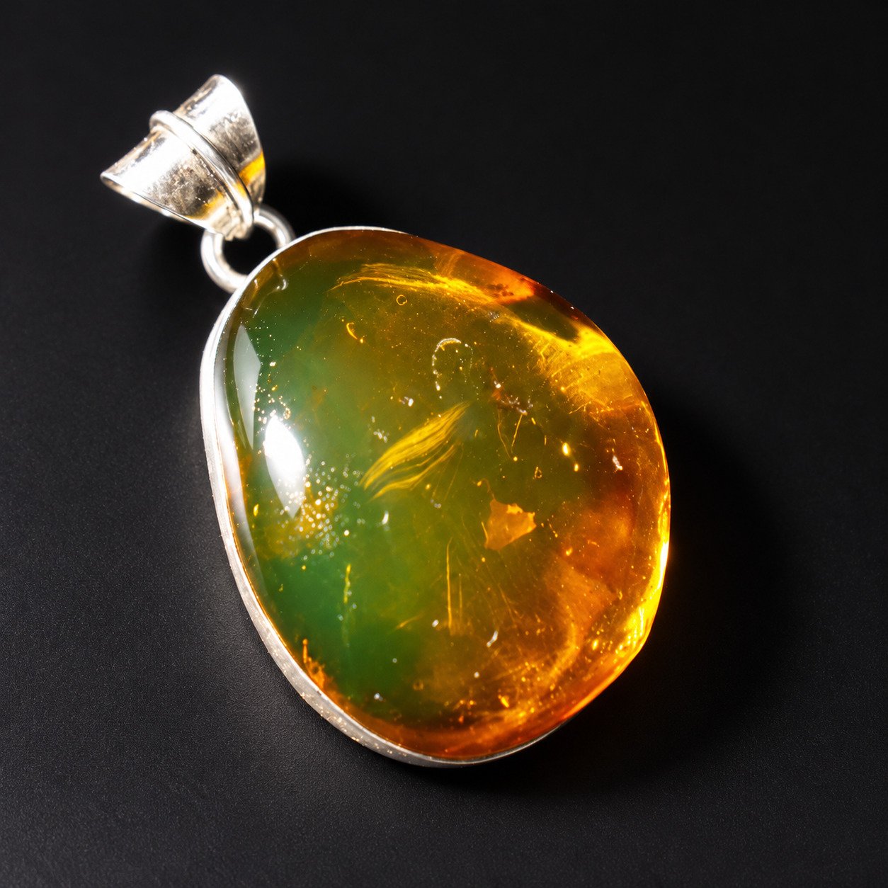 Master crafted orange green Dominican amber sterling silver pendant 5.7g