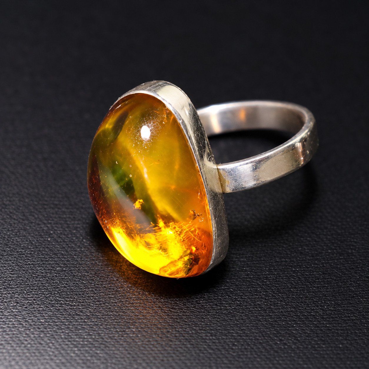 Hand finished orange yellow Dominican amber sterling silver ring 4.4g